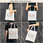 Nioobager canvas Christian tote bag handle drop perspective