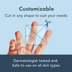Customizable XL hydrocolloid sheet being cut with scissors for precise body acne treatment