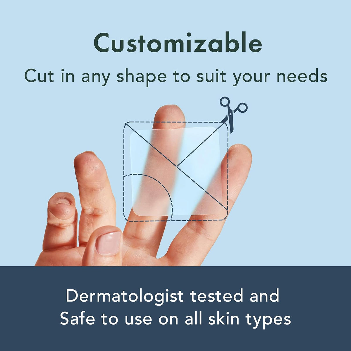 Customizable XL hydrocolloid sheet being cut with scissors for precise body acne treatment