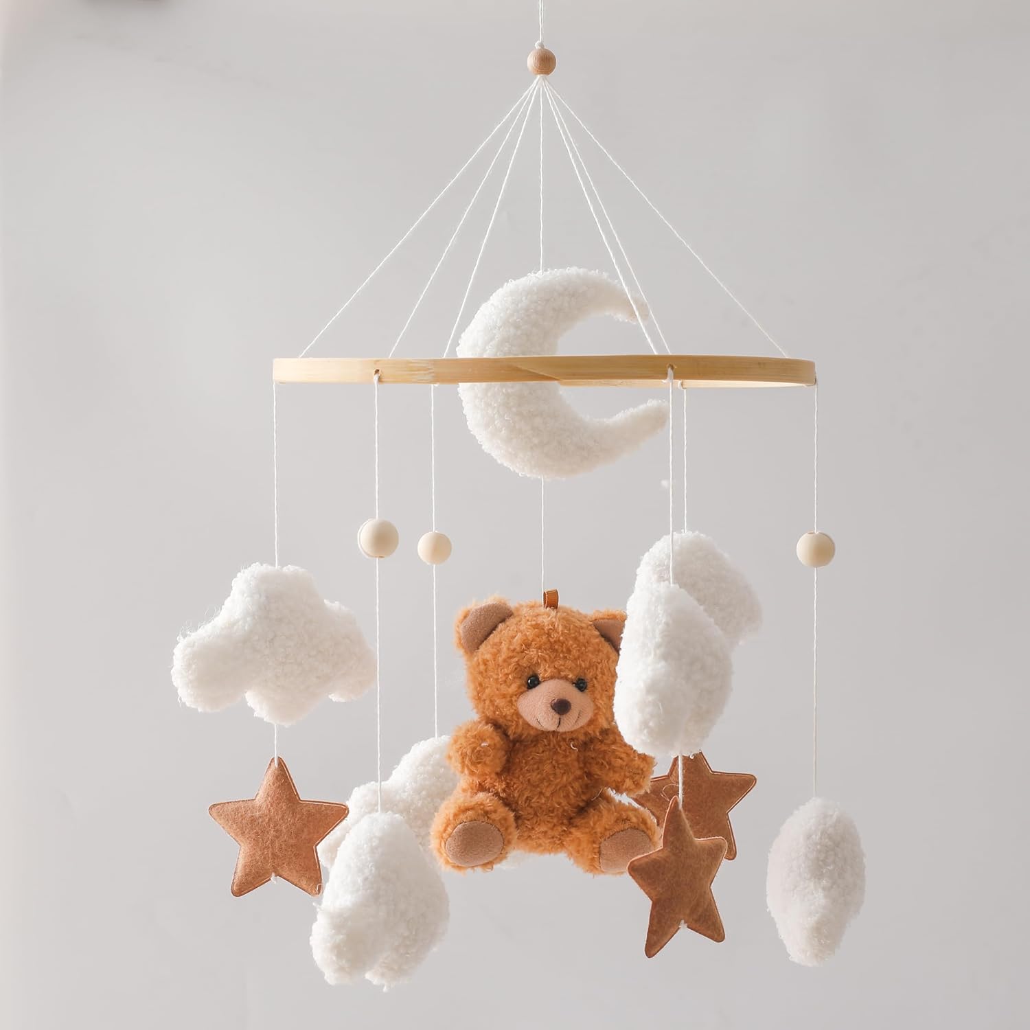 Mamimami Home EERKEOD baby crib mobile front view showcasing plush brown bear and wooden ring decoration