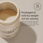 Premium USA sourced colostrum powder container placed on a clean kitchen counter.