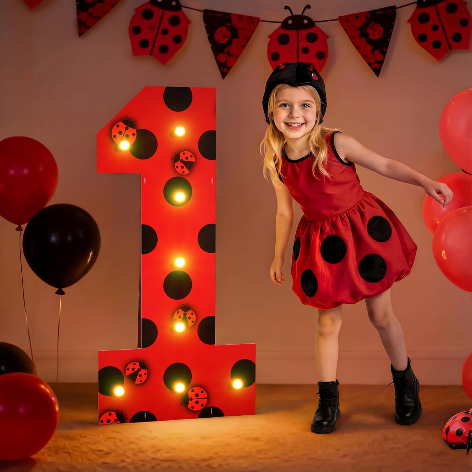 Imprsv Ladybug Birthday Party Decorations Marquee Number One front view illuminated with warm light bulbs.
