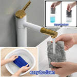 Demonstrating wet and dry cleaning under a refrigerator