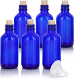 Juvitus cobalt blue glass boston round bottle front view glass container