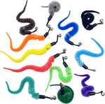 Cat playing actively with interactive worm wand toy