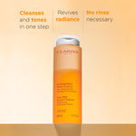 Clarins bi-phase cleanser orange gradient bottle typography
