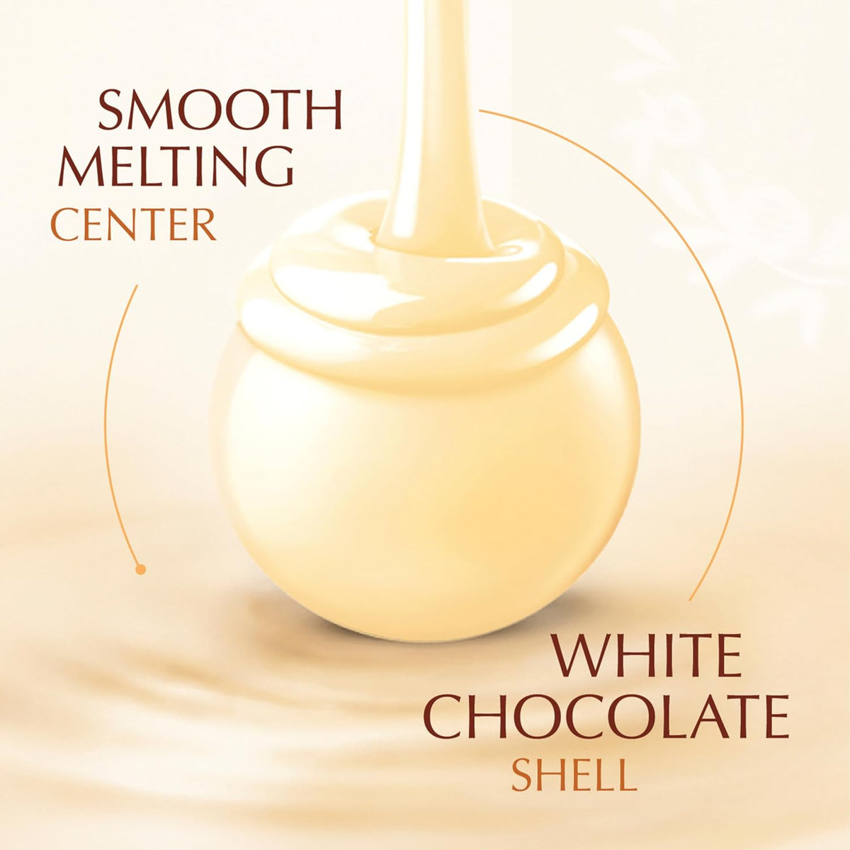Individually wrapped white and gold foil gourmet chocolate truffles spilling out of box