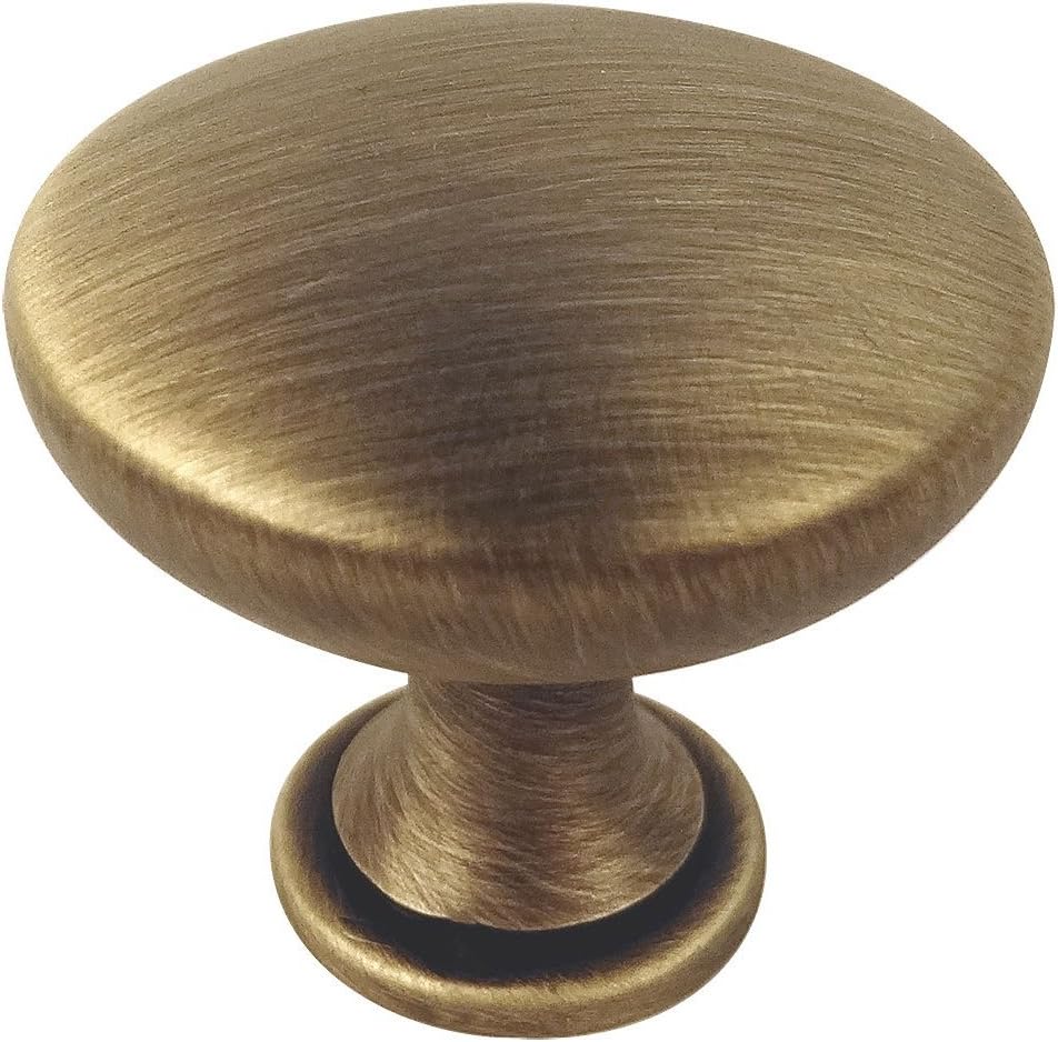 Cosmas traditional round solid cabinet hardware knob front view featuring brushed antique brass finish