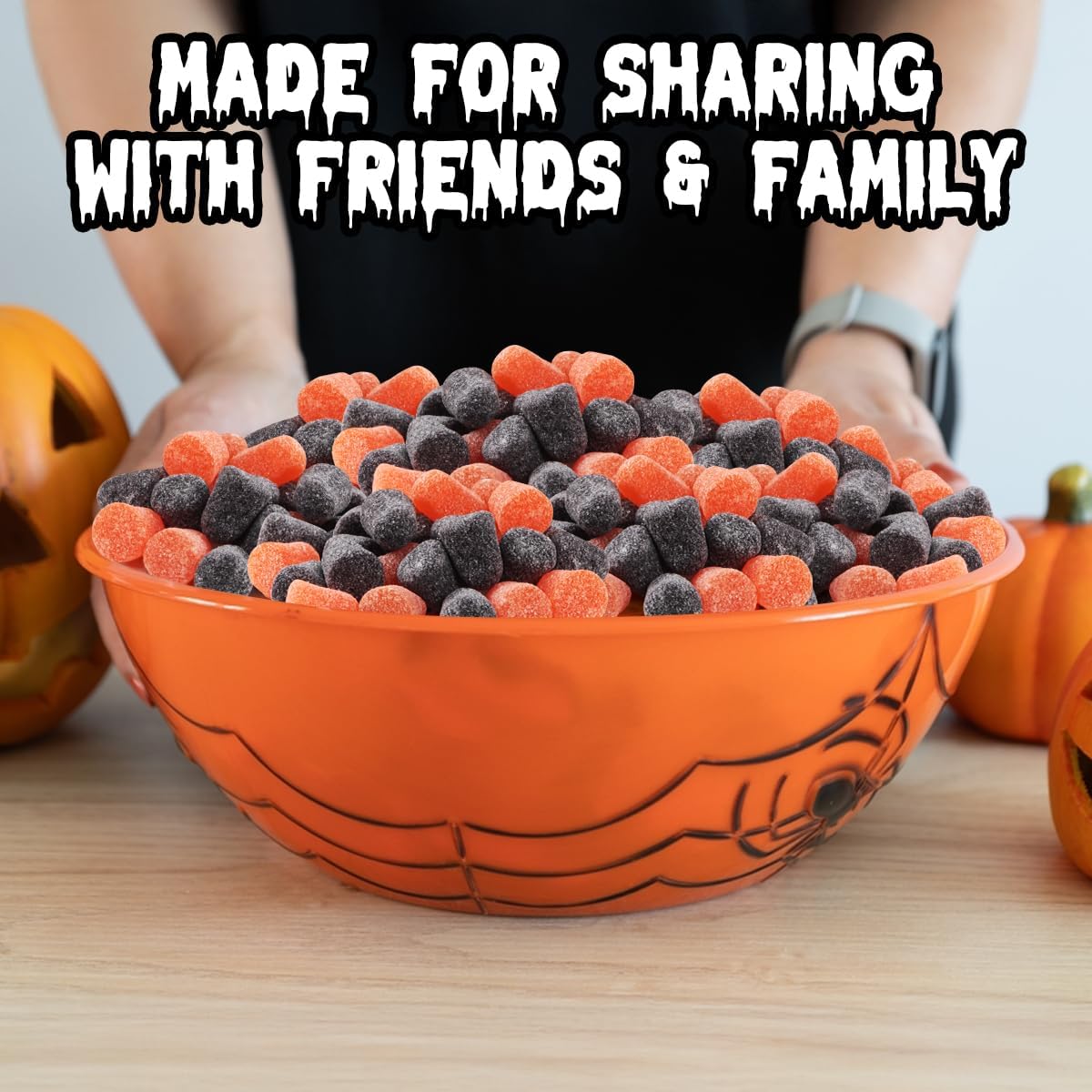 Festive black and orange spice drops in a candy bowl