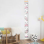 LoveNite baby growth chart displayed in nursery room