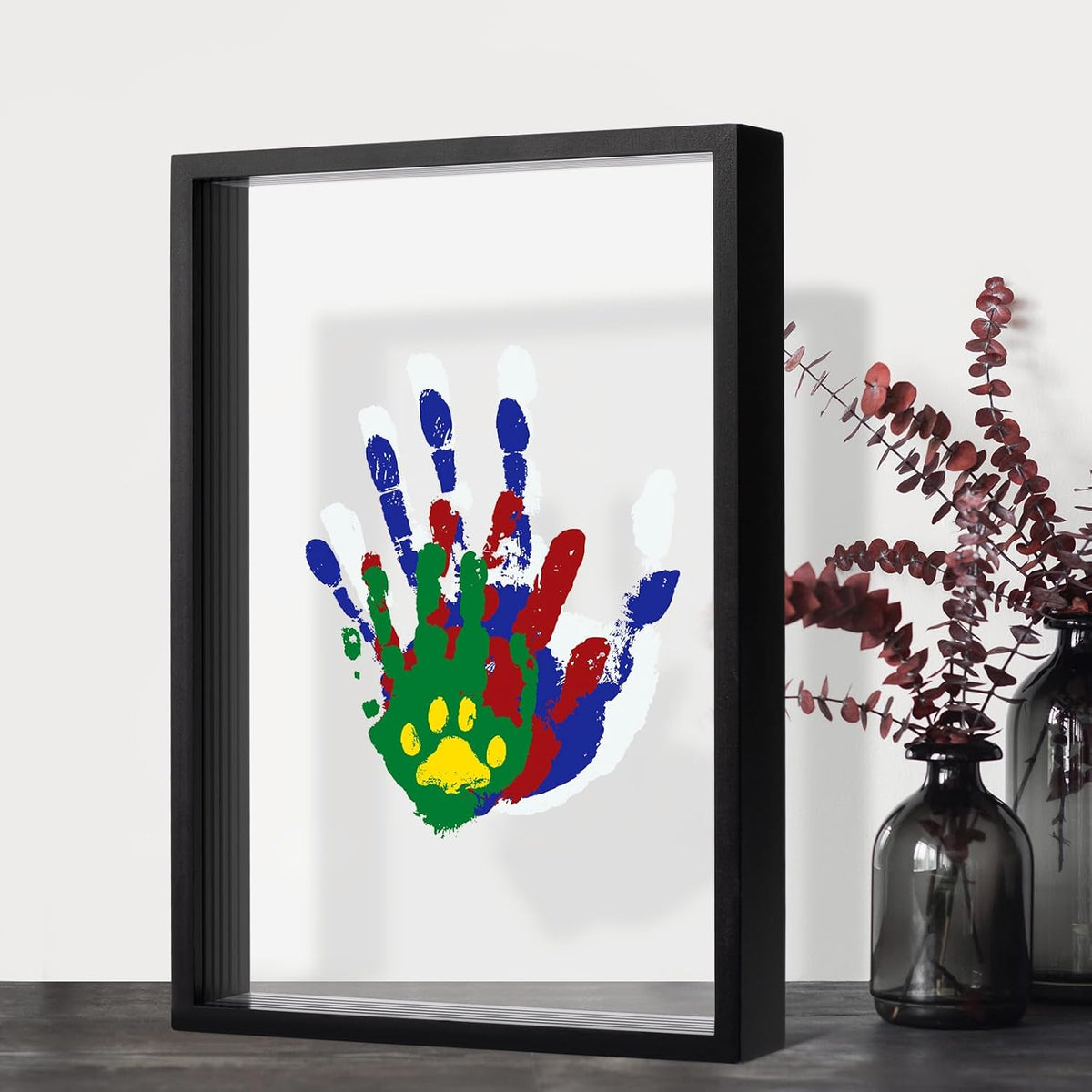 Guanshiya Family Handprint Kit front view showcasing the black wooden frame and 3D layered colored handprints.