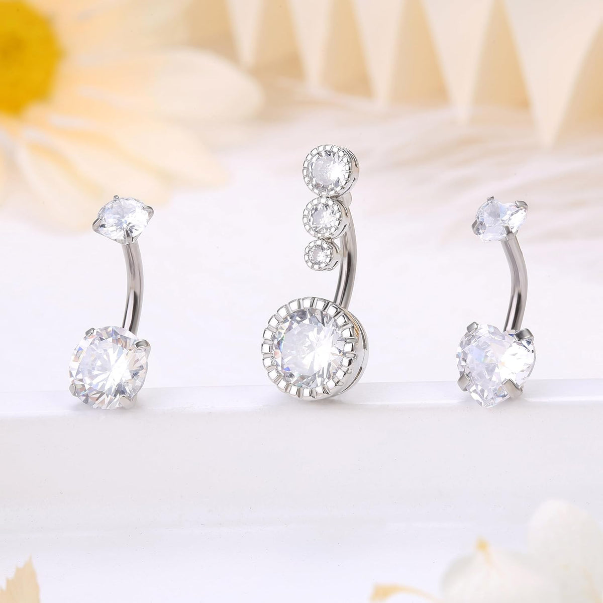 Zankulas butterfly dangle navel piercing close up
