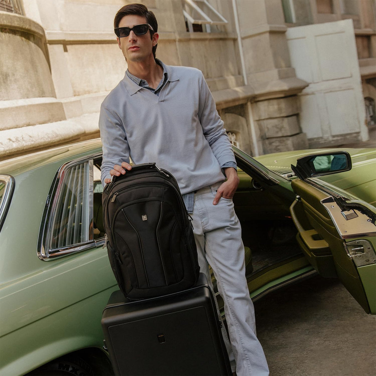 LEVEL8 business backpack lifestyle shot worn by a traveler in an airport.