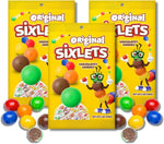 Vibrant colorful candy coated chocolate balls close up