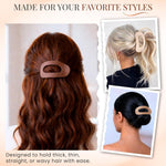 Set of six oval flat hair accessories arranged neatly side by side