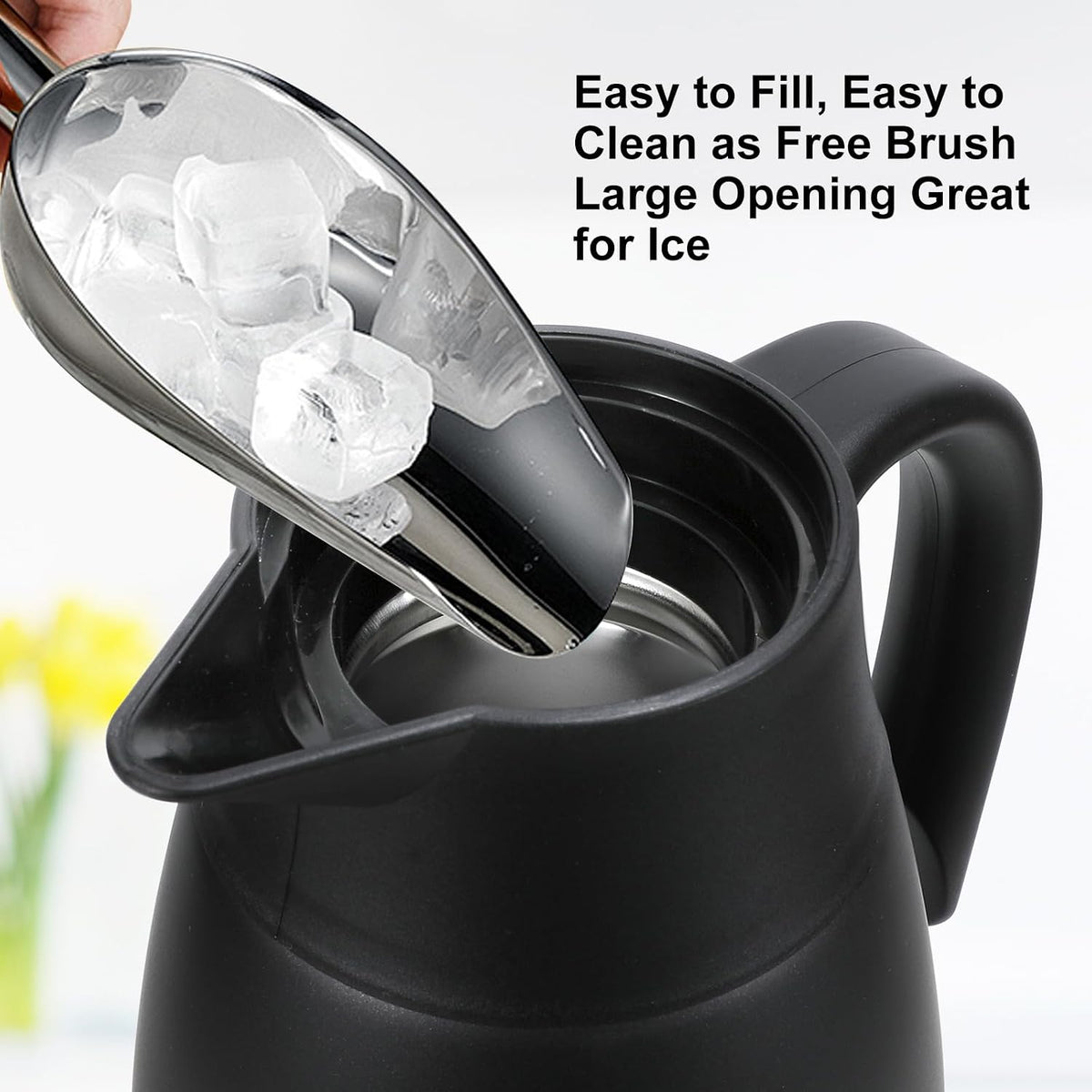 Dumfoin insulated jug pouring mechanism detail
