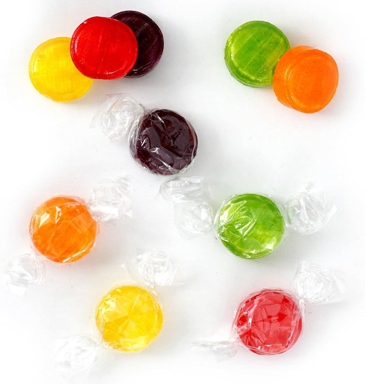 Individually wrapped fruit hard candies spread out