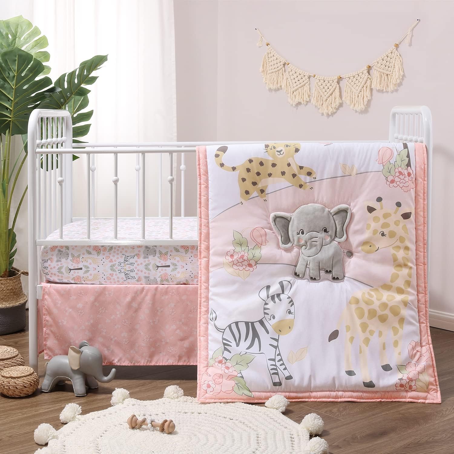 The Peanutshell Wildest Dreams 3 piece baby crib bedding set for girls showing the complete pink and grey safari themed nursery arrangement.