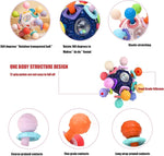 Baby holding Tohibee Montessori development toy for motor skills