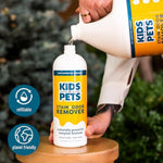 Kids 'N' Pets stain remover bottle being used on a carpet stain