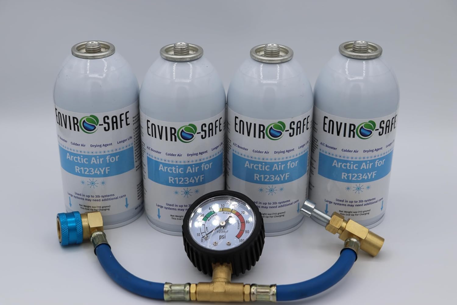Enviro-Safe Arctic Air R1234YF performance booster kit showing four four-ounce cans and brass charging gauge front view.