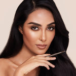 Swatches of Charlotte Tilbury Brow Cheat shades on skin