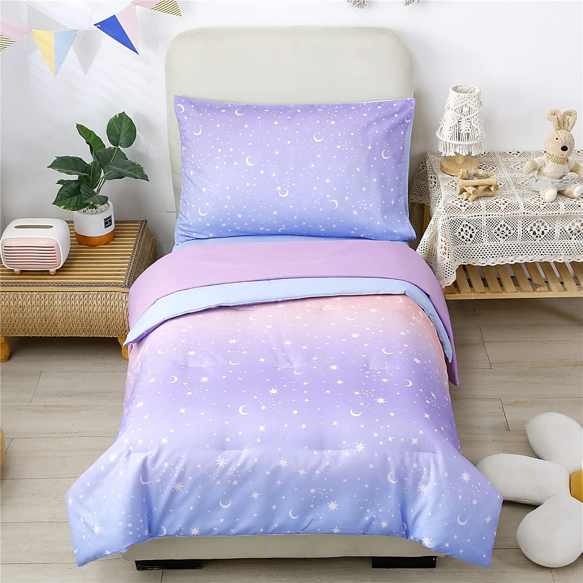 URBONUR 4 piece toddler bedding set for girls front view showcasing the glitter purple and orange gradient star pattern.