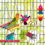 Bird cage setup demonstrating the arrangement of wood perch stands and interactive bird climbing racks