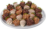 Open gift box of 12 chocolate strawberries ready for service
