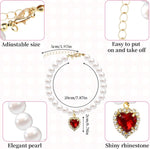 Close up view of the high quality imitation pearls and sparkling heart rhinestone on the cat collar