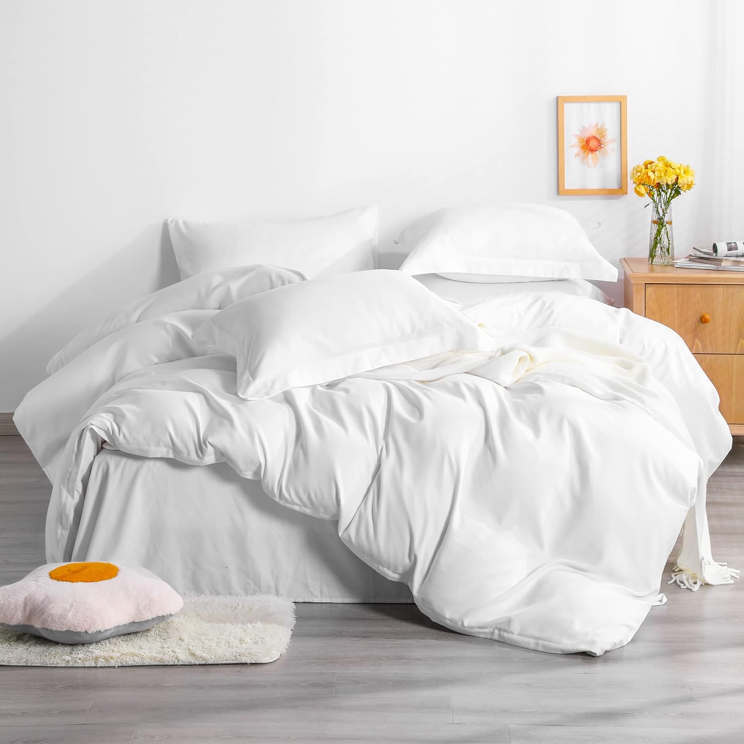 NTBAY twin duvet cover set front view in crisp solid white spread neatly on a minimalist bed setup