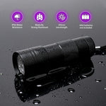 Waterproof IPX4 blacklight flashlight being exposed to water splashes during testing.
