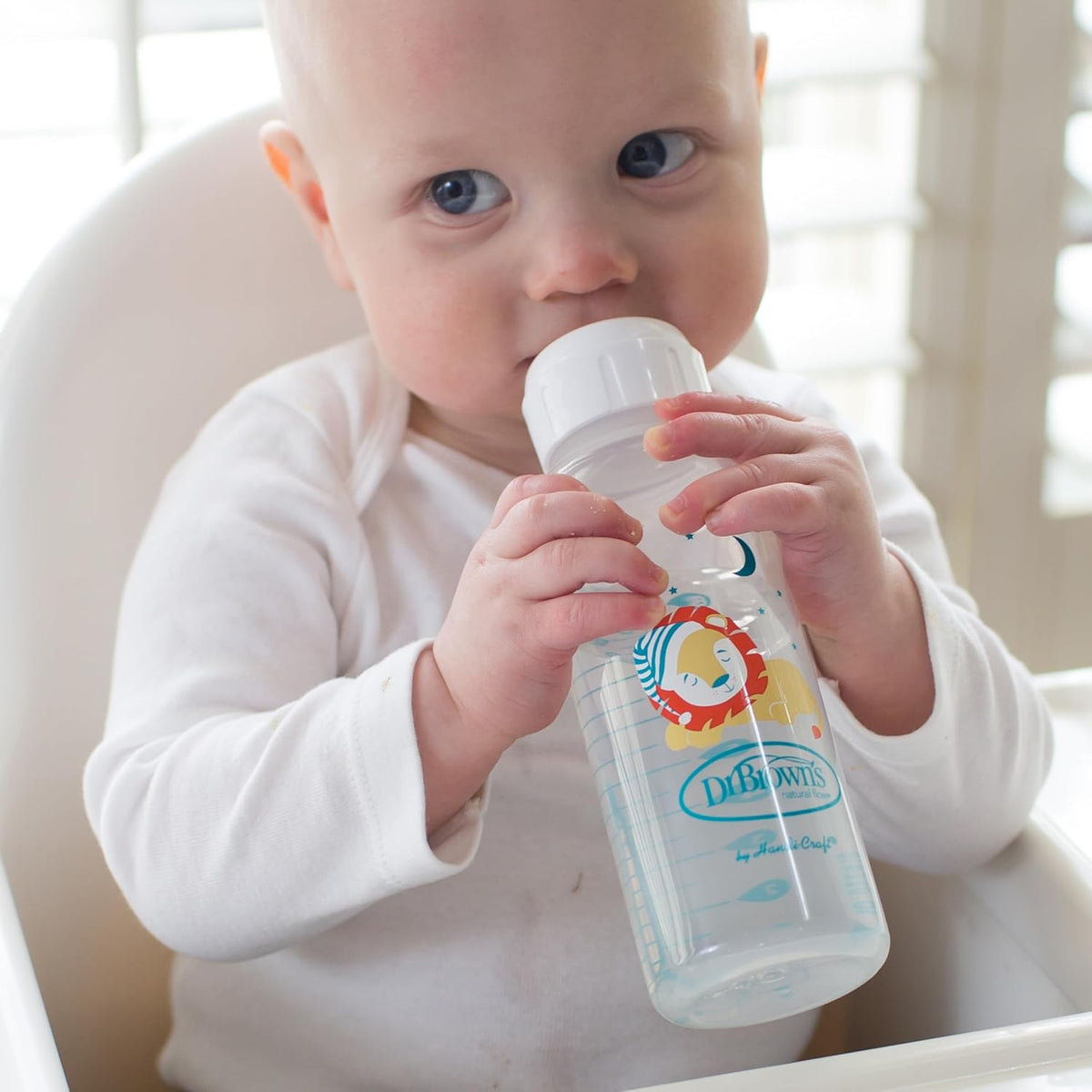 Dr. Brown's lion print baby feeding bottle lifestyle angle