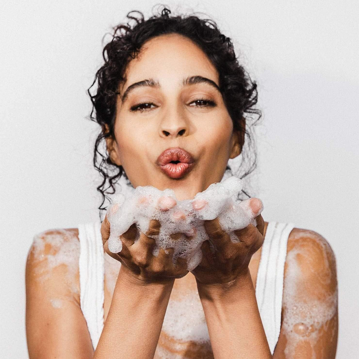 Kopari aluminum-free deodorant application on skin with non-sticky clear finish