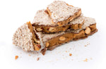 Enstrom Milk Chocolate Almond Toffee close up of milk chocolate coating and crushed almonds