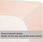 N&Y HOME pink fitted sheet folded neatly