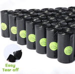 Black heavy-duty pet waste bags with green bone-shaped dispensers for dog walks.