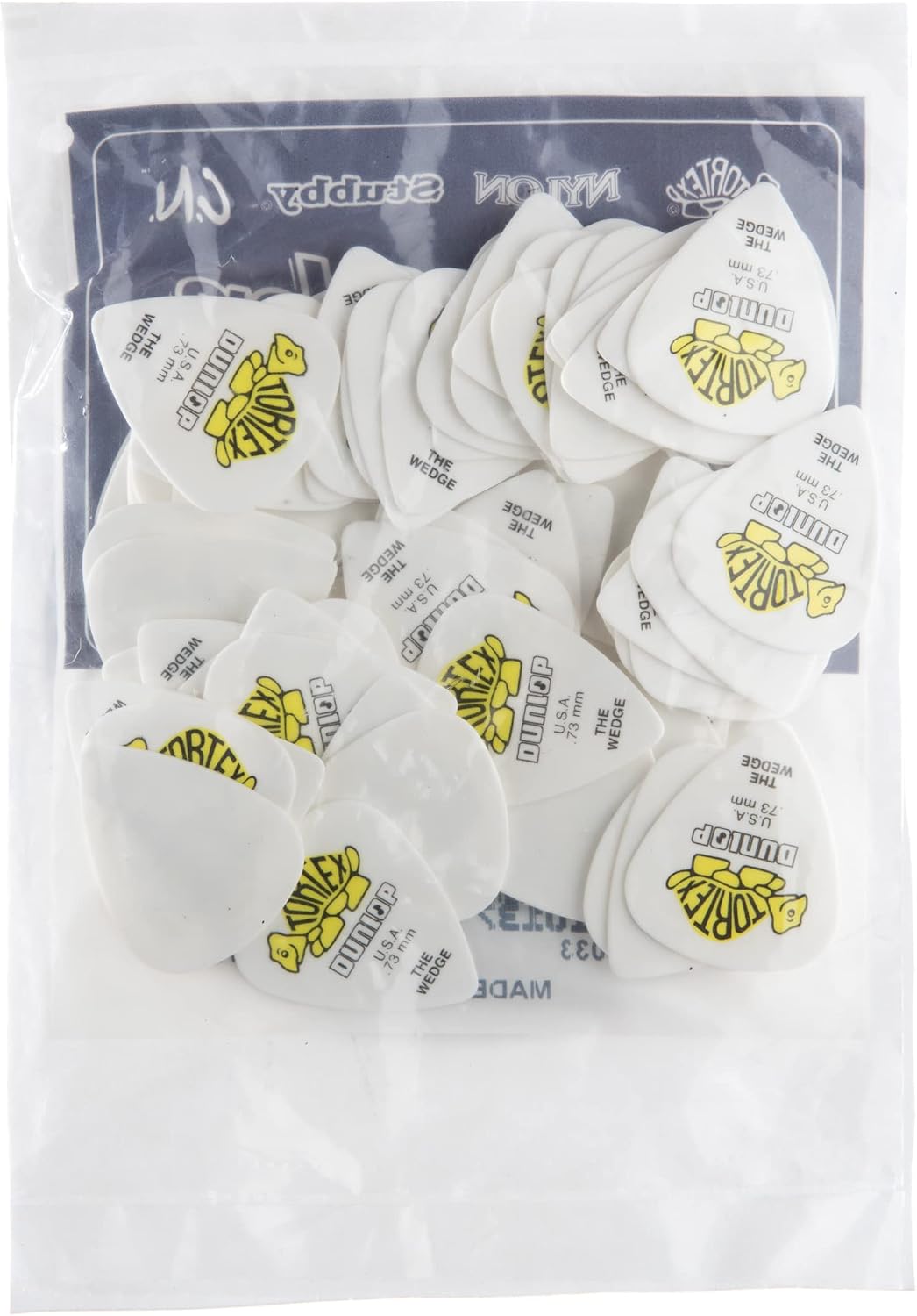 Collection of yellow Tortex Wedge guitar picks arranged together