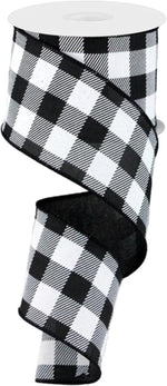 Side angle view of 10 yards emerald green check ribbon spool