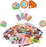 Assorted colorful lollipops and individually wrapped treats spread out from the bag.