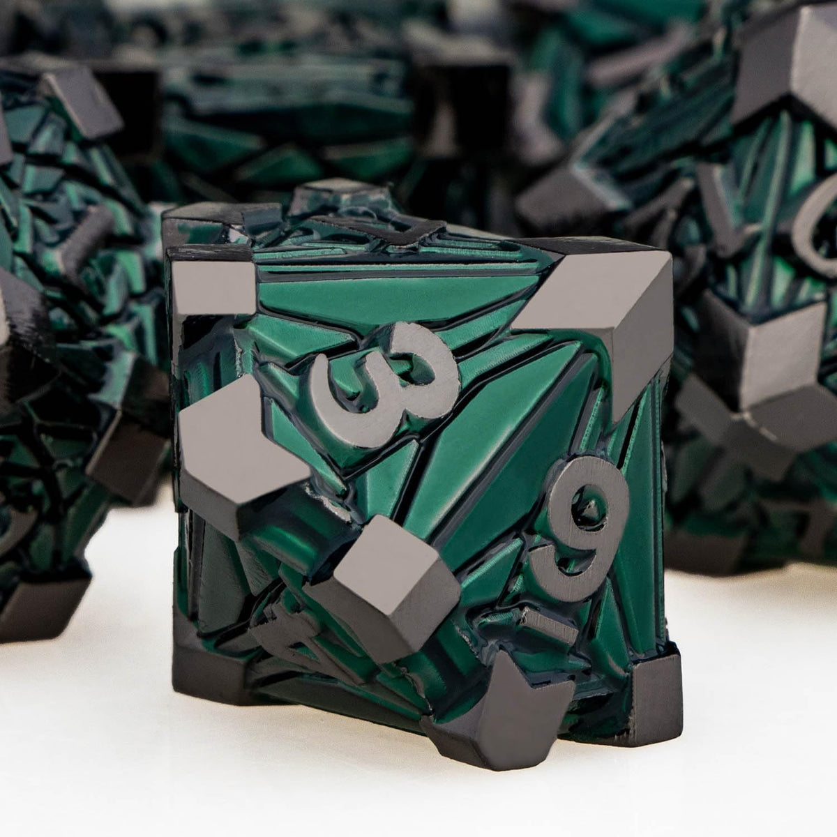 Complete 7 piece DND metal dice collection arranged on surface