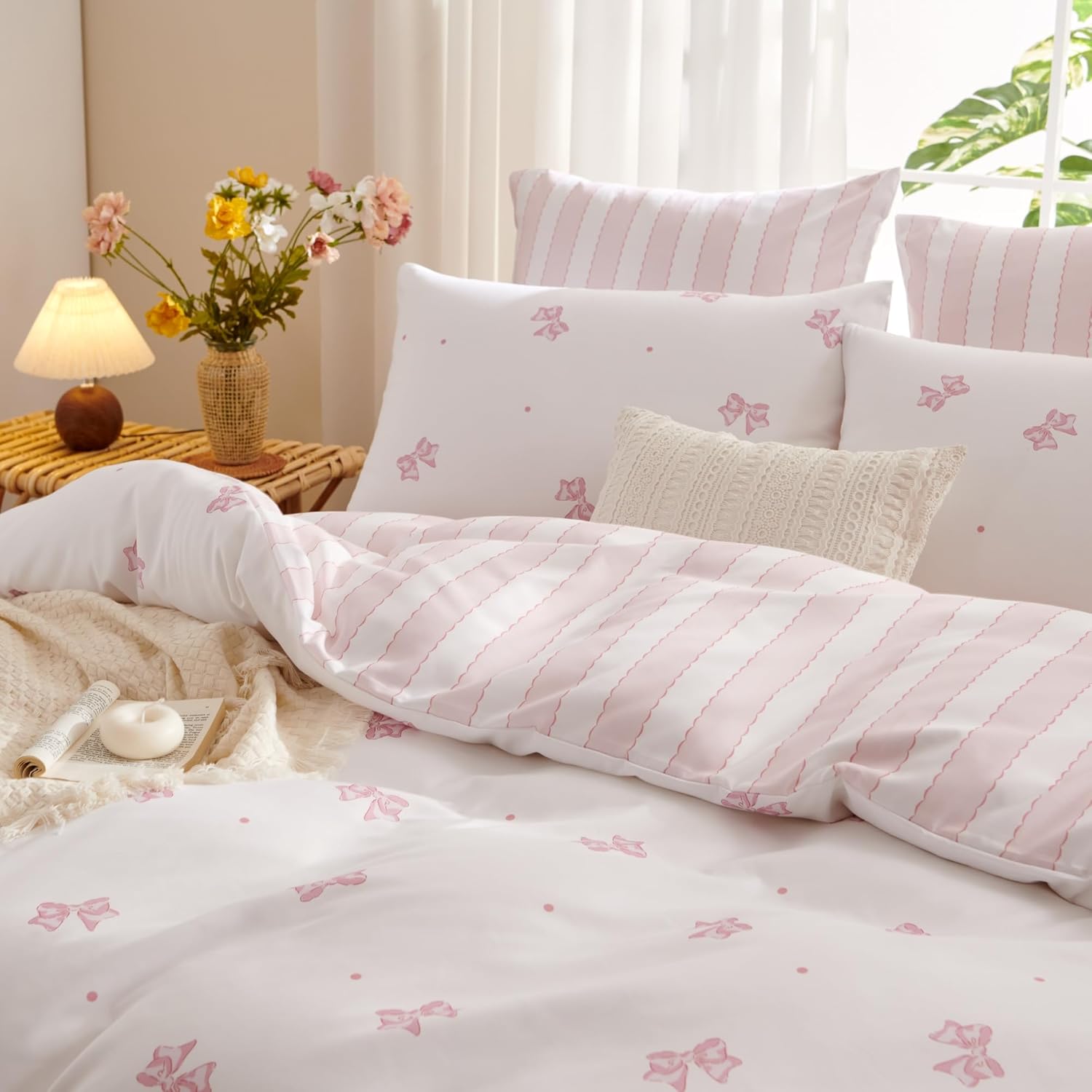Bildenly pink bow twin duvet cover front view on a styled girl bedroom bed