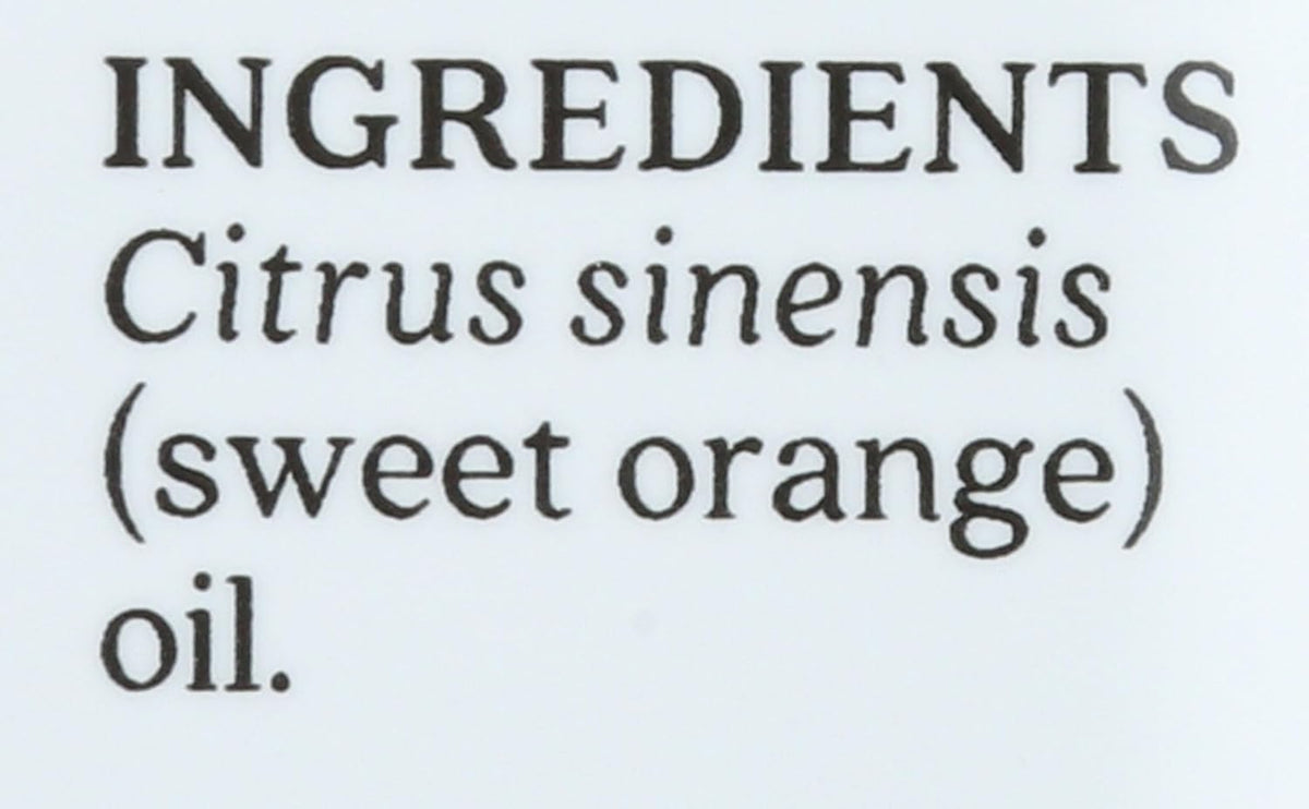 Aura Cacia sweet orange oil bottle next to fresh citrus fruit