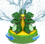 Oiimllby dinosaur water sprinkler front view showing dark green rotating base on backyard lawn
