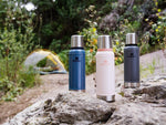 Side view of the authentic Stanley vacuum insulated travel thermos in premium Limestone colorway.