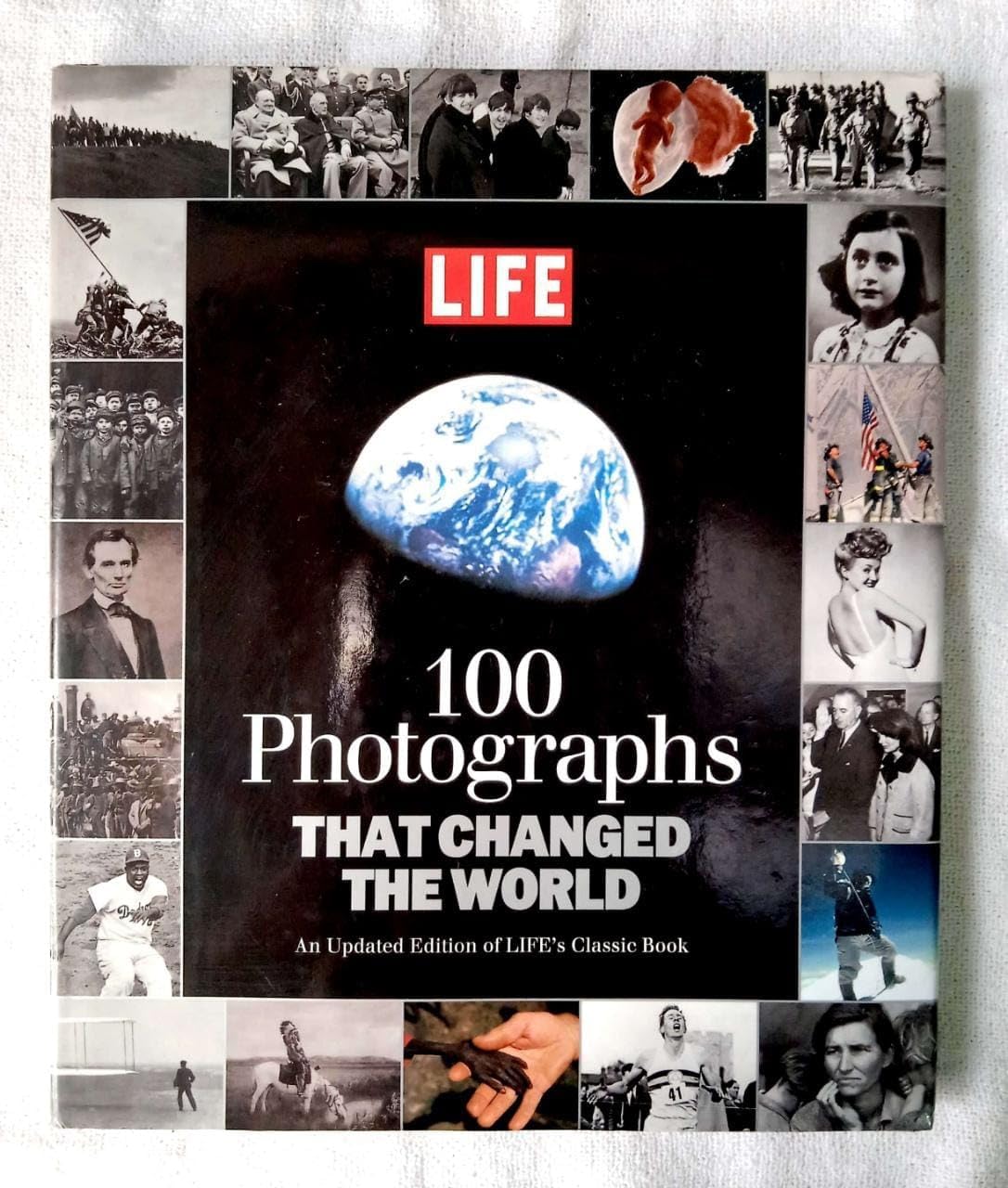 LIFE 100 Photographs that Changed the World: An Updated Edition of LIFE's Classic Book - Image 1