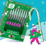 Four boxes of imported Christmas confectionery bulk pack side view.