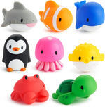 Close up of Munchkin cow and pig floating bath toys for infants