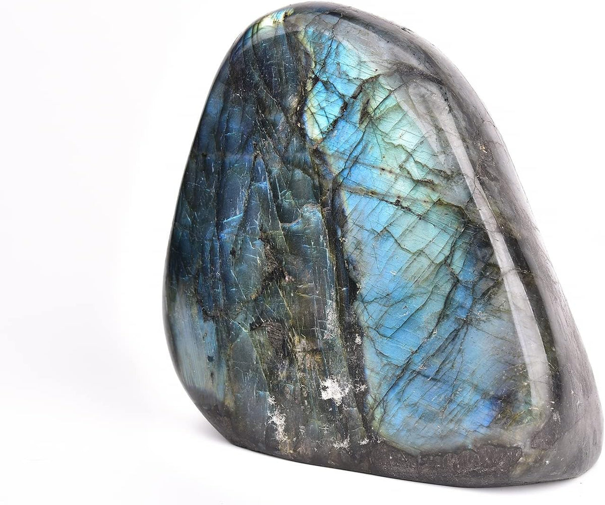 Jic Gem upright worry stone angled under bright illumination.
