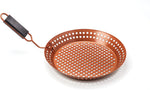 Outset grill skillet front view showing copper non-stick surface